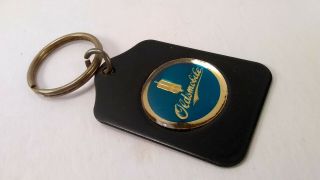 Vintage Nos Oldsmobile Old Round Logo Keychain Fob Keyring B - E Industries Usa