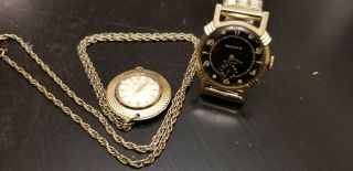 Two Bulova Vintage Watches / One Mens Wristwatch And One Ladies Necklace Watch