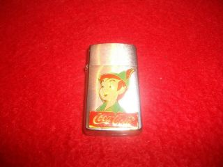 Vintage Coke / Disney Peter Pan Zippo Lighter Slim