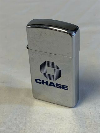 Vintage 1981 Zippo Slim Chase Bank Lighter