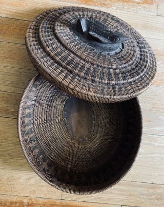 Antique Large Coiled Woven Lidded Basket With Carved Fetish Handle