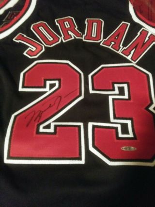 Uda Signed Michael Jordan Nike Black Autograph Upper Deck Jersey.