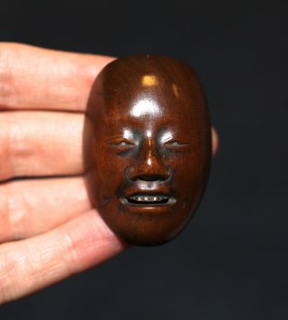 Antique Japanese Carved Boxwood Netsuke Of A Mask,  Signed Deme,  19th Century.