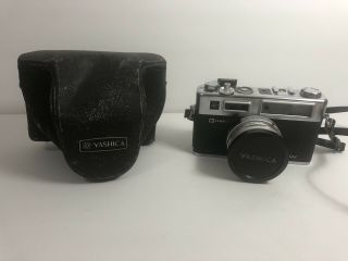 Vintage Yashica Electro 35 Gsn Chrome 35mm Camera With Case & Strap