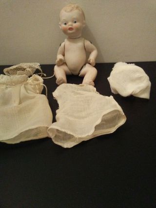 Antique Small Bisque Baby Doll Blue Eyes And Rosie Cheeks
