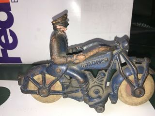 7.  25” Antique Hubley Cast Iron Blue Champion Motorcycle