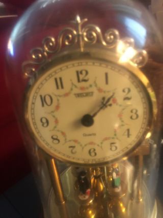 Vintage Trenckle Quartz Mantle Clock With Dome And Rotating Pendulums