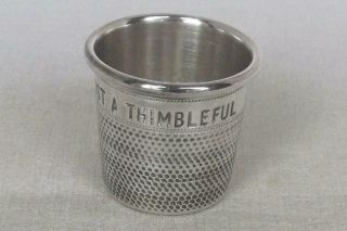 A Novelty Solid Silver Just A Thimbleful Spirit Measure Cup Dates 1982.