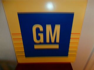 Vintage GM sign Blue and whitw plastic 18 
