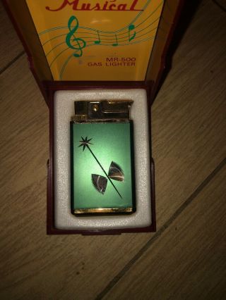 Vintage Royal Musical Butane Gas Lighter And Sales/display Case Green