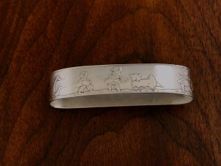 - American Sterling Silver Napkin Ring Decorated With Nursery Rhyme Characters