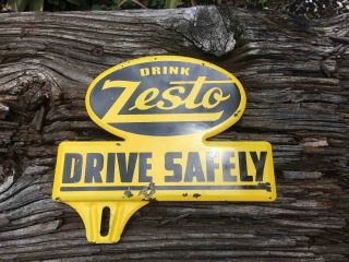 Vintage Drink Zesto Soda Drive Safely Metal Advertising License Plate Topper