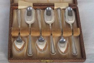 A Case Set Of Six Solid Sterling Silver Coffee Spoons Sheffield 1957.