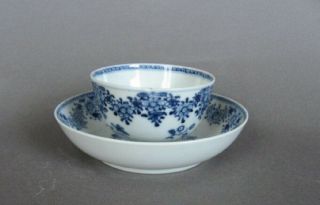 A Chinese 18th C.  Blue And White Porcelain Tea Bowl And Saucer,  With Garlands.