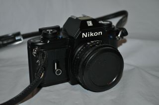 Vintage Nikon Em 35mm Slr Film Camera With Series E 50mm 1.  8 Lens And Strap