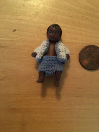 Antique miniature,  tiny dollhouse Black doll,  bisque,  crochet outfit,  jointed 1.  75” 2
