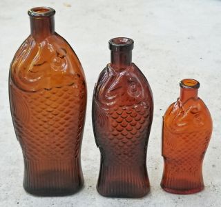 S/3 Vintage Amber Glass Cod Liver Oil Fish Bottles Eli Lilly Fairmont Glass