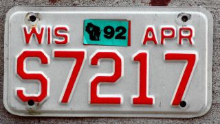 1989 Red On White Wisconsin Motorcycle License Plate With A 1992 Sticker