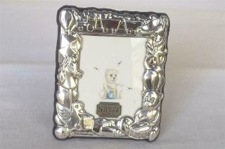 A Stunning Boxed Sterling Silver Christening Photo Frame Sheffield 1998.