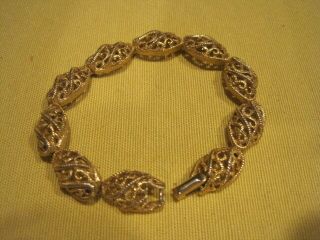 Trifari Gold Tones Bracelet Vintage 7 " Open Oval Swirled Design Jewelry Marked