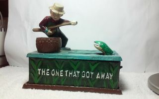Vintage Cast Iron Mechanical Bank " The One That Got Away "