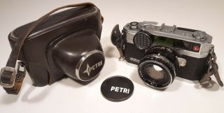 Petri E.  Bn 35mm Ccs Rangefinder Camera W/ Lens Cap & Leather Case Vintage 1960s