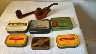 Vintage Pipes And 6 X Tobacco Tins With Treen Pipe Rest Holder.