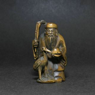 Netsuke - The Old Man Crane Momo Shichifukujin - Japanese Wooden Figure Sculpture