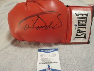 Canelo Alvarez Signed Boxing Glove & Rocky Fielding.  Beckett