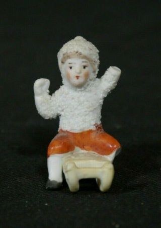 Antique German Bisque Porcelain Snow Baby Figurine Seated Sledding 23