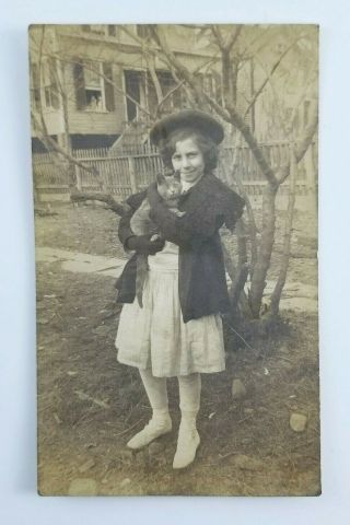 Vintage Real Photo Postcard Girl Holding A Cat Outside