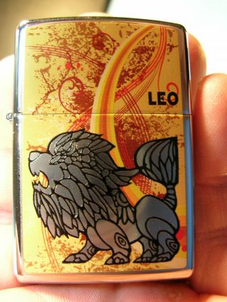 NIB ZIPPO LIGHTER.  Chrome ZODIAC LEO LION dated L/11 2