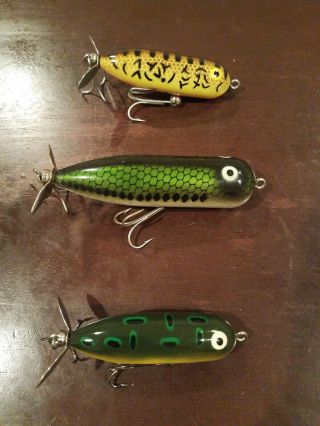 One Heddon Magnum Torpedo And Two Heddon Baby Torpedo Lures