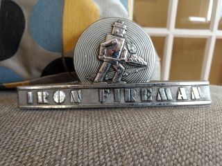 Vintage Iron Fireman Coal Stove Furnace Badge Plate Emblem Robot Figure
