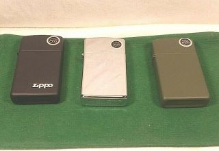 3 Collectible Slim Zippo Lighters Black Matte,  Polished Chrome,  And Green Matte