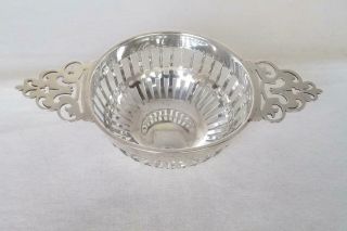 A Victorian Solid Silver Twin Handled Pierced Bowl By William Comyns London 1896