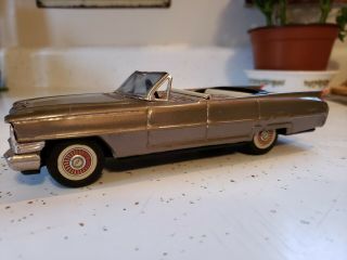 Vtg Made In Japan Tin Litho Sign Of Quality Cadillac Convertible Friction Toy