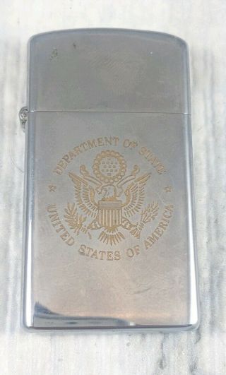 Vintage 1974 Slim Zippo Lighter With Usa Department Of State Badge Advertisement