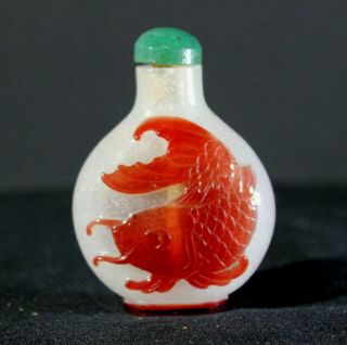 Qing Dynasty,  Ch’ien Lung Period,  Red On White Glass Snuff Bottle With A Carp