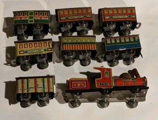 Antique Tin Train Penny Toy Japan Uchiumi