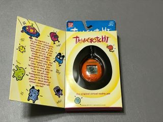 Vintage 1997 Bandai Tamagotchi Orange Keychain Virtual Reality Pet 1800