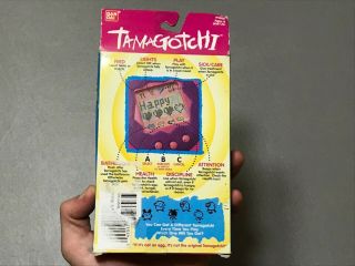 Vintage 1997 BANDAI TAMAGOTCHI Orange Keychain Virtual Reality Pet 1800 3