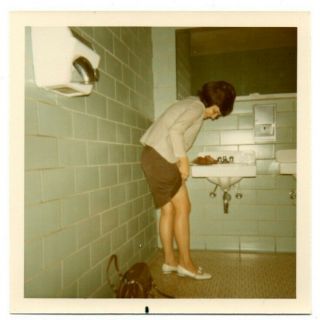 Bathroom Woman Hiking Up Skirt Showing Legs Leg Risque Vintage Snapshot Photo