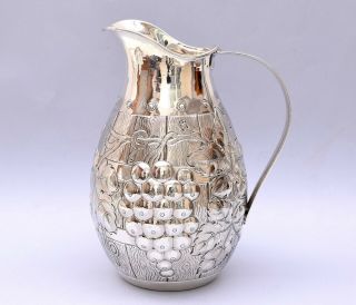 SOLID SILVER REPOUSSE PITCHER / WINE JUG.  718 grams / 25.  33 ounce 2