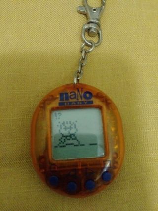 Vintage Nano Baby Virtual Pet Keychain By Playmate Toys