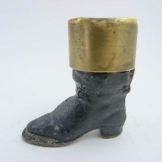 Antique Cast Metal And Brass Matchholder And Striker In The Form Of A Boot