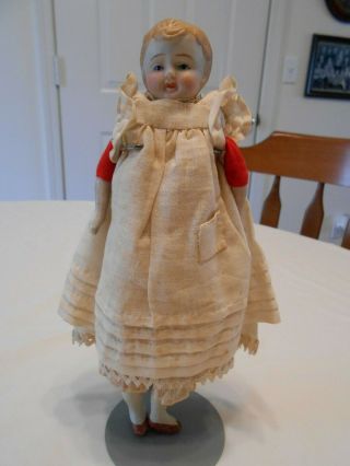 Antique 9 " Foreign Bisque Head Doll W/ Bisque Arms & Legs & Red Cloth Body