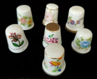 Vintage Porcelain Set Of 7 Thimbles W/hand Painted Flowers