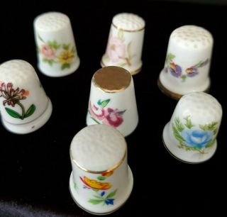 Vintage Porcelain Set of 7 Thimbles w/hand painted flowers 2
