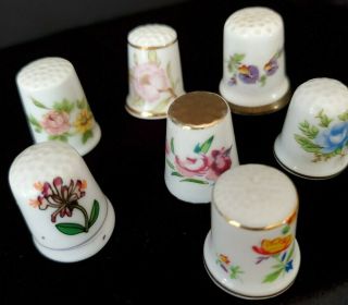 Vintage Porcelain Set of 7 Thimbles w/hand painted flowers 3